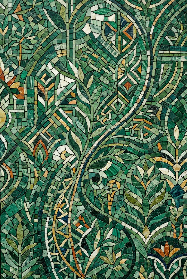 Närbild av ett mönster av grön marmormosaik som skapar en abstrakt textur med variationer i ton och ljushet.